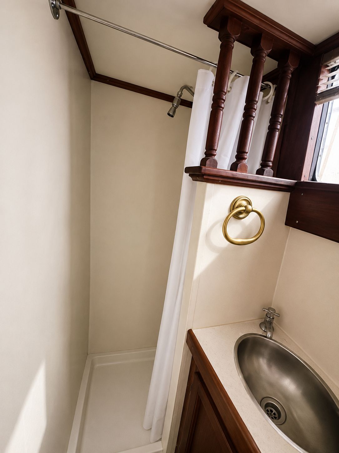 Interior of 1951 Chris-Craft 50 Catalina with shower and sink.