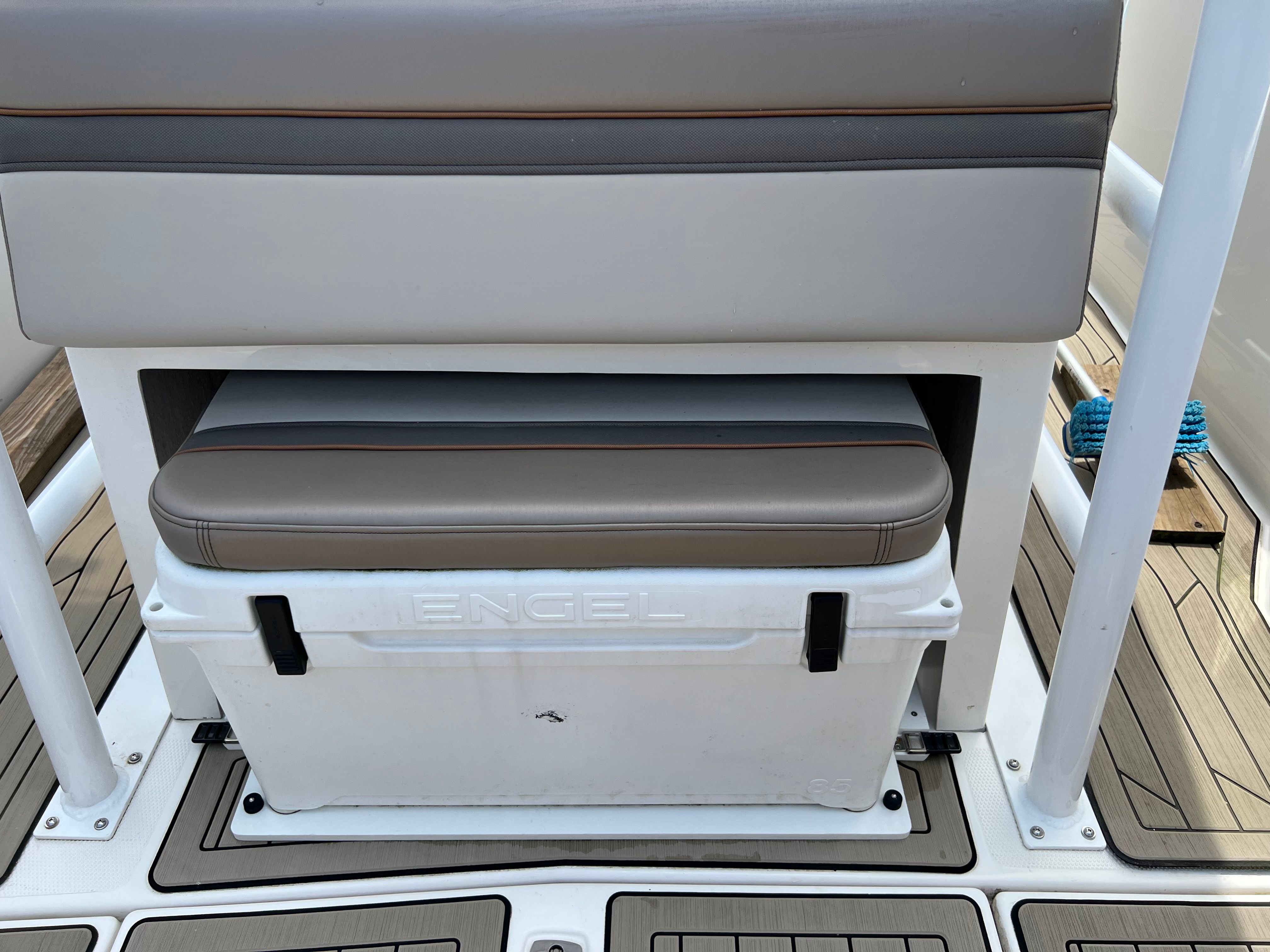 The 2022 Cutwater C-24 CW's rear bench seat with an Engel cooler underneath.
