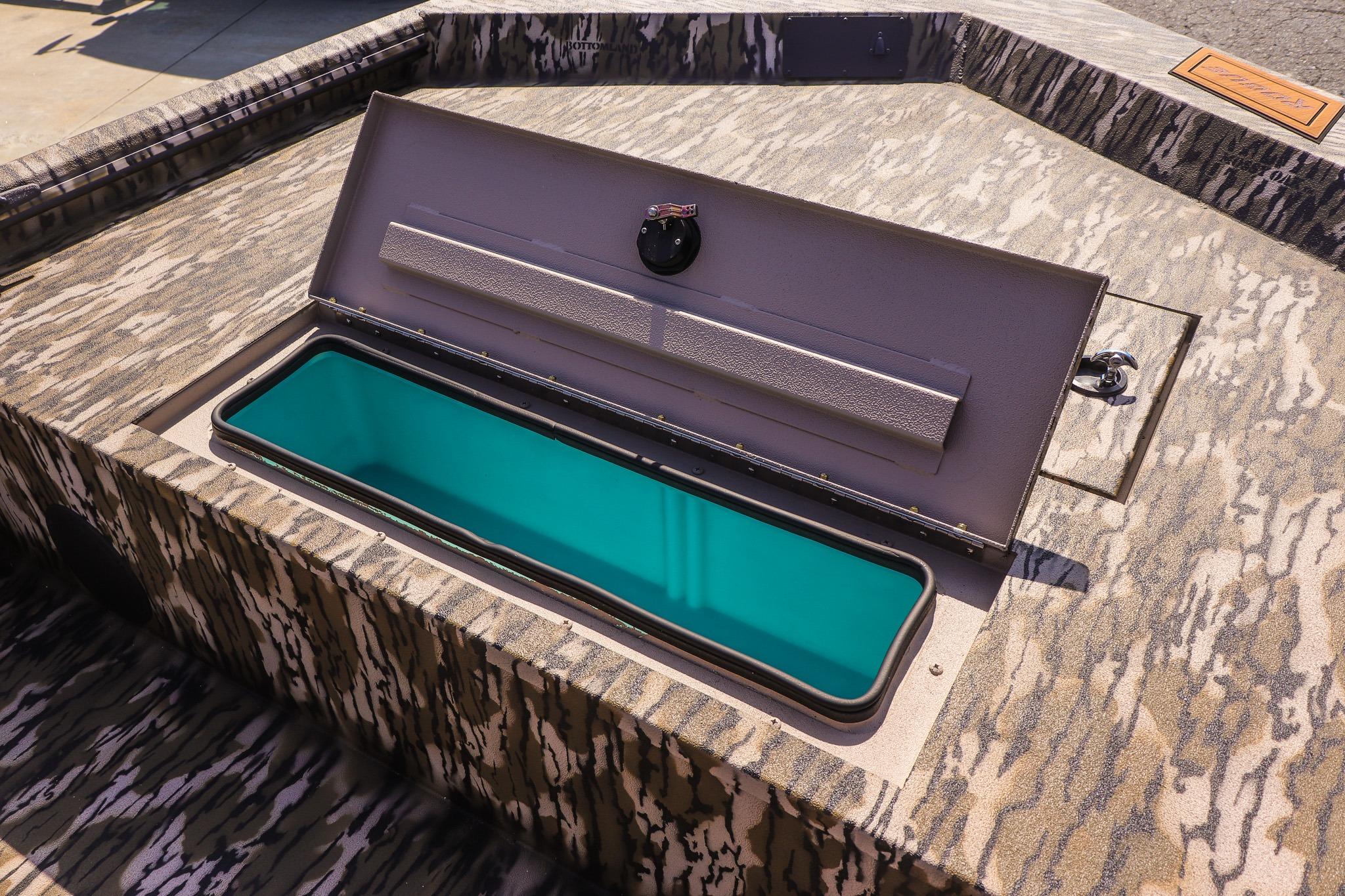 Avid 20 Rogue CC 2027 with an open storage compartment on the deck.