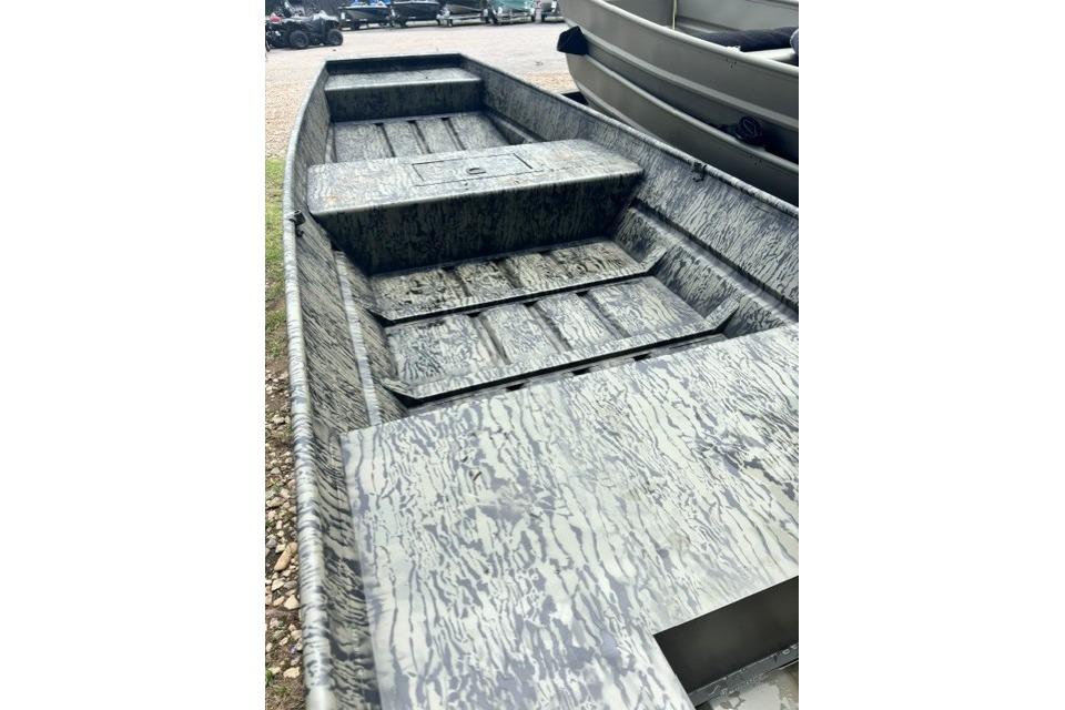 2026 Tracker Grizzly 15 Jon boat with camouflage interior design.