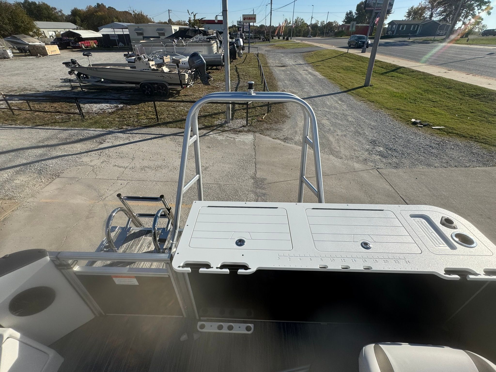 Landau 23C Atlantis 2026 parked at a boatyard.