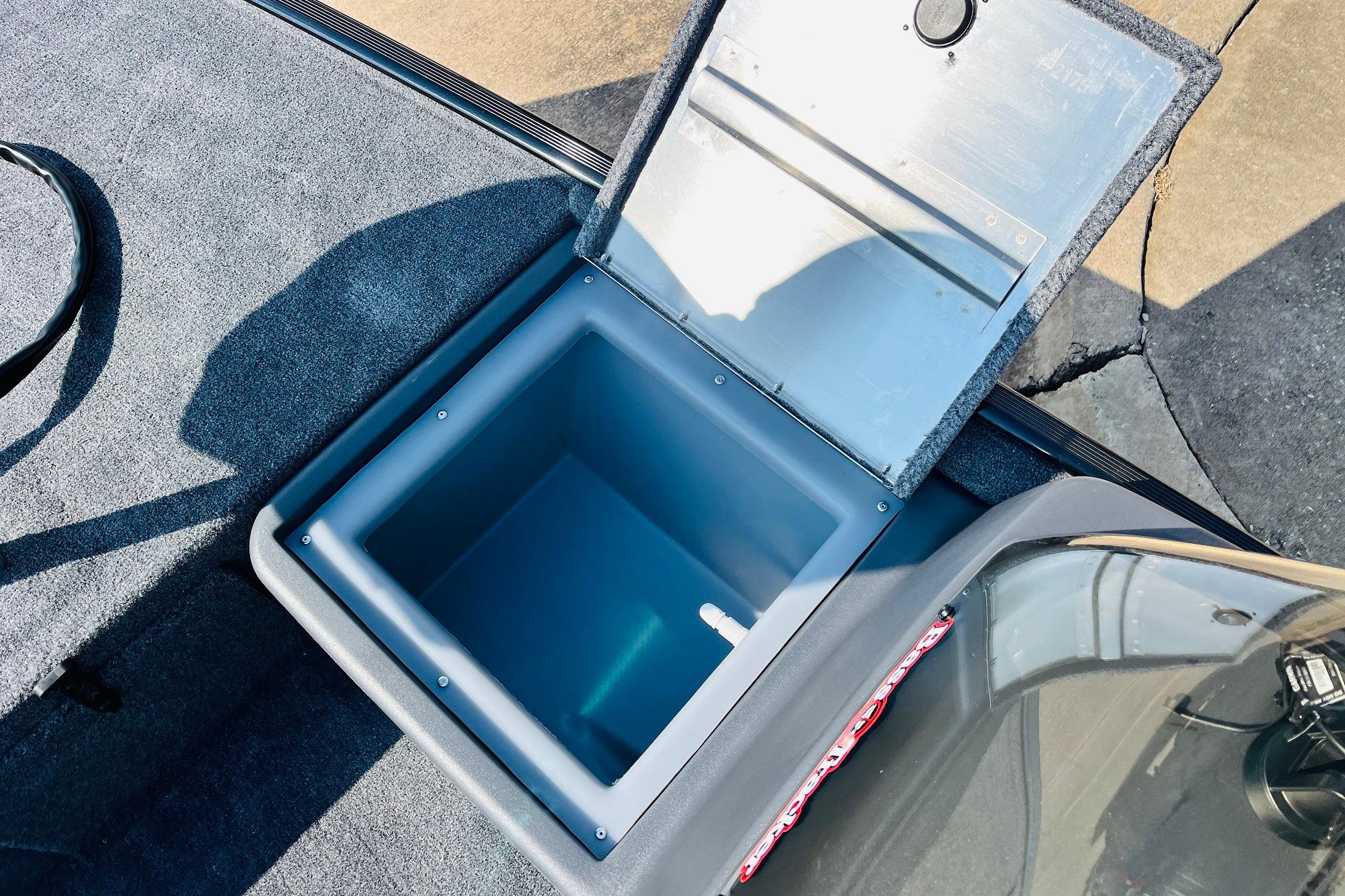 Open storage compartment in 2026 Tracker Bass Tracker Classic XL boat.
