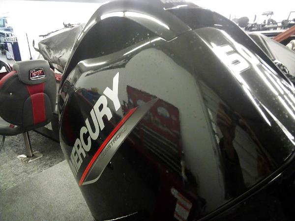 2025 Ranger VS1665 SC boat with Mercury engine, featuring sleek black design.