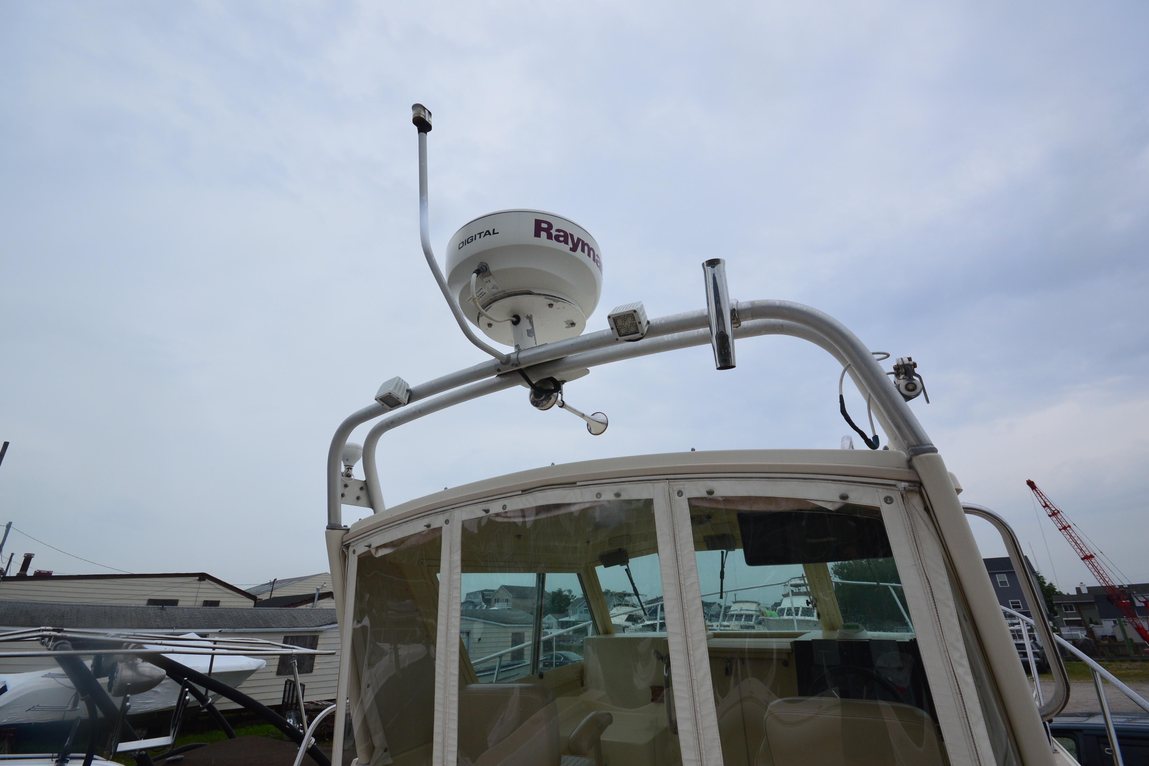 2001 Albin 28 Tournament Express boat with radar equipment on top.