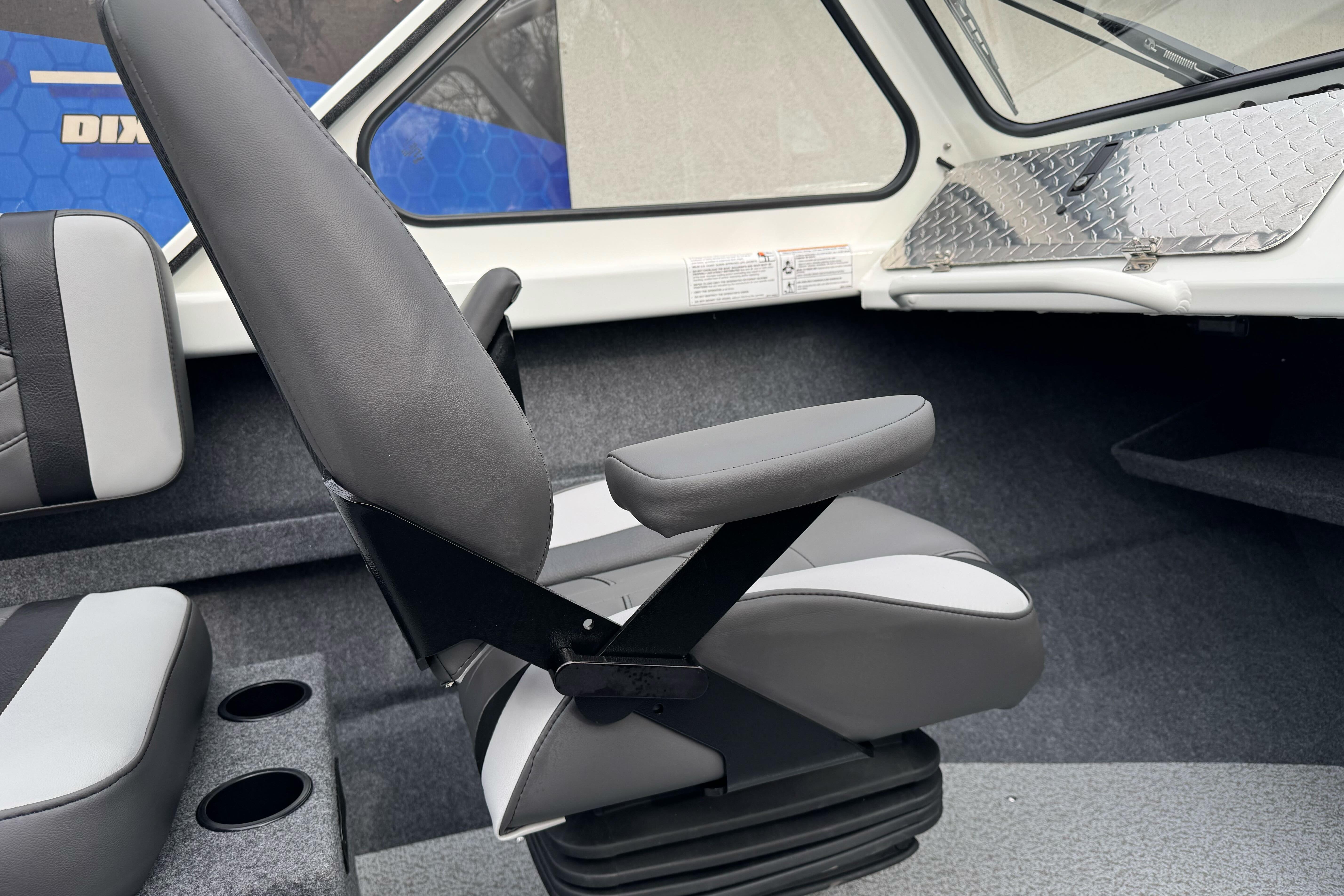 2026 Lund 185 Heavy Gauge boat interior with gray seating and cup holders.