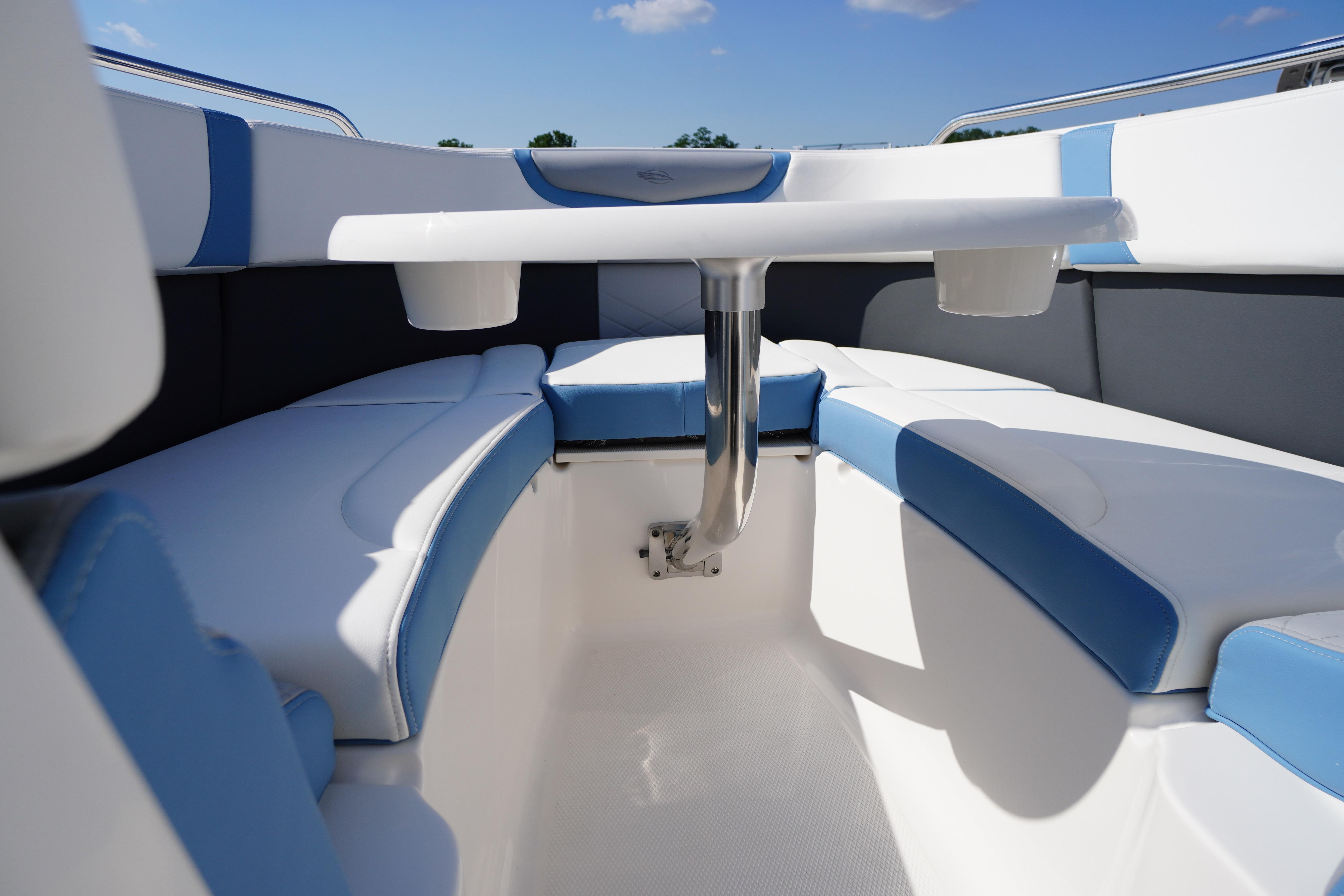 Interior view of 2026 Chaparral 270 OSX boat, featuring sleek seating and modern design.