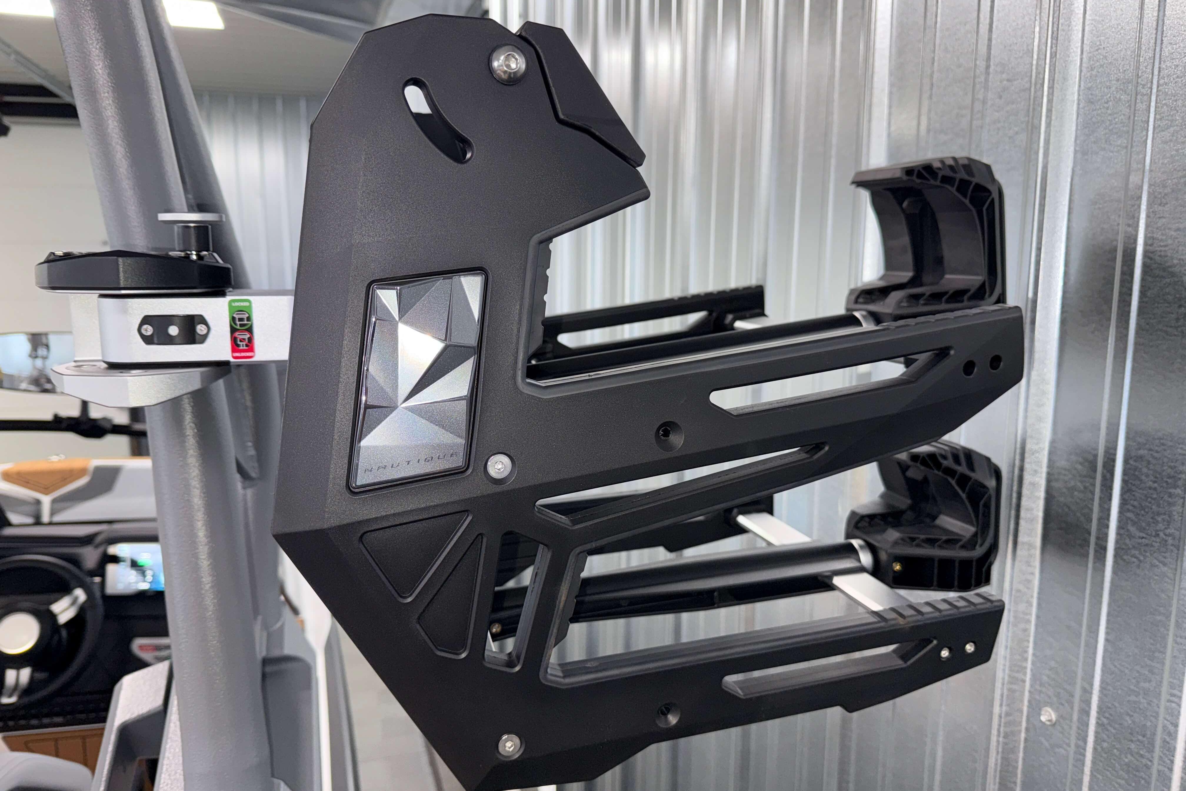2026 Nautique Super Air Nautique GS22 wakeboard rack in a modern boat interior.