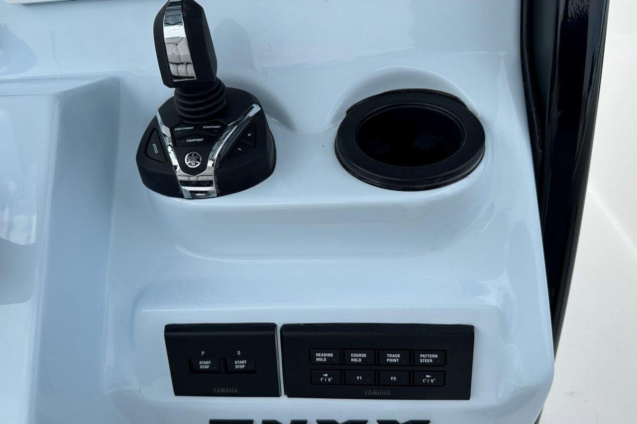Control panel of 2026 Tidewater 272 LXF boat with joystick and buttons.