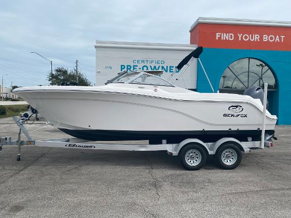 2020 Sea Fox 226 Traveler boat on a trailer outside a dealership.