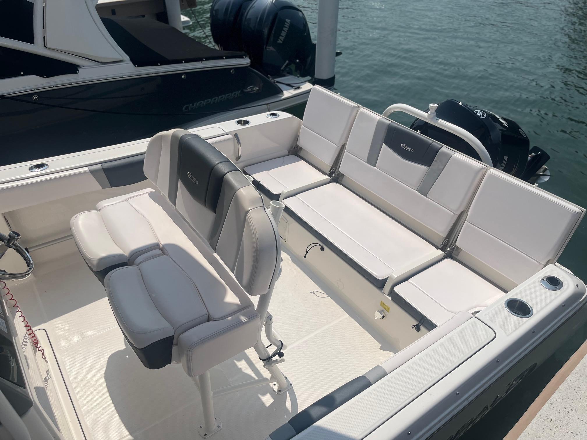 2020 Robalo R230 Center Console boat interior with seating and cup holders.