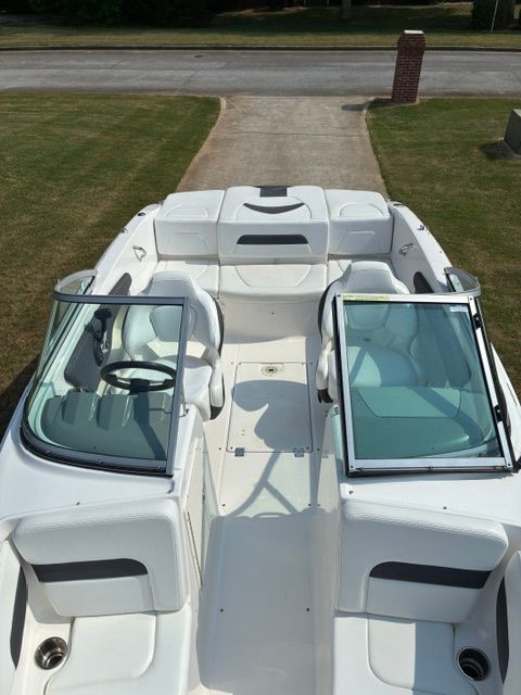 The image shows the cockpit of a 2012 Chaparral 19 H2O Sport boat.
