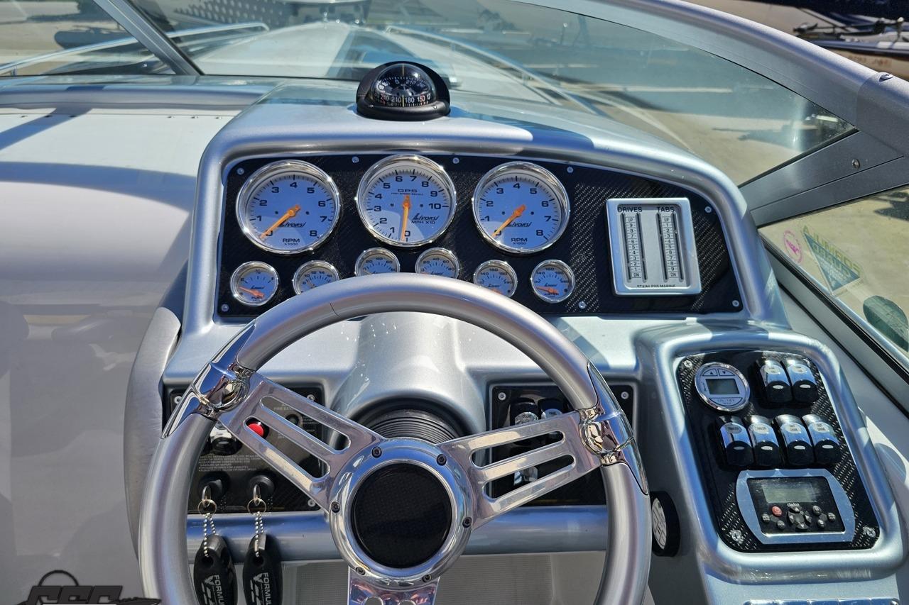 Dashboard of a 2014 Formula 292 FASTech boat with gauges and controls.