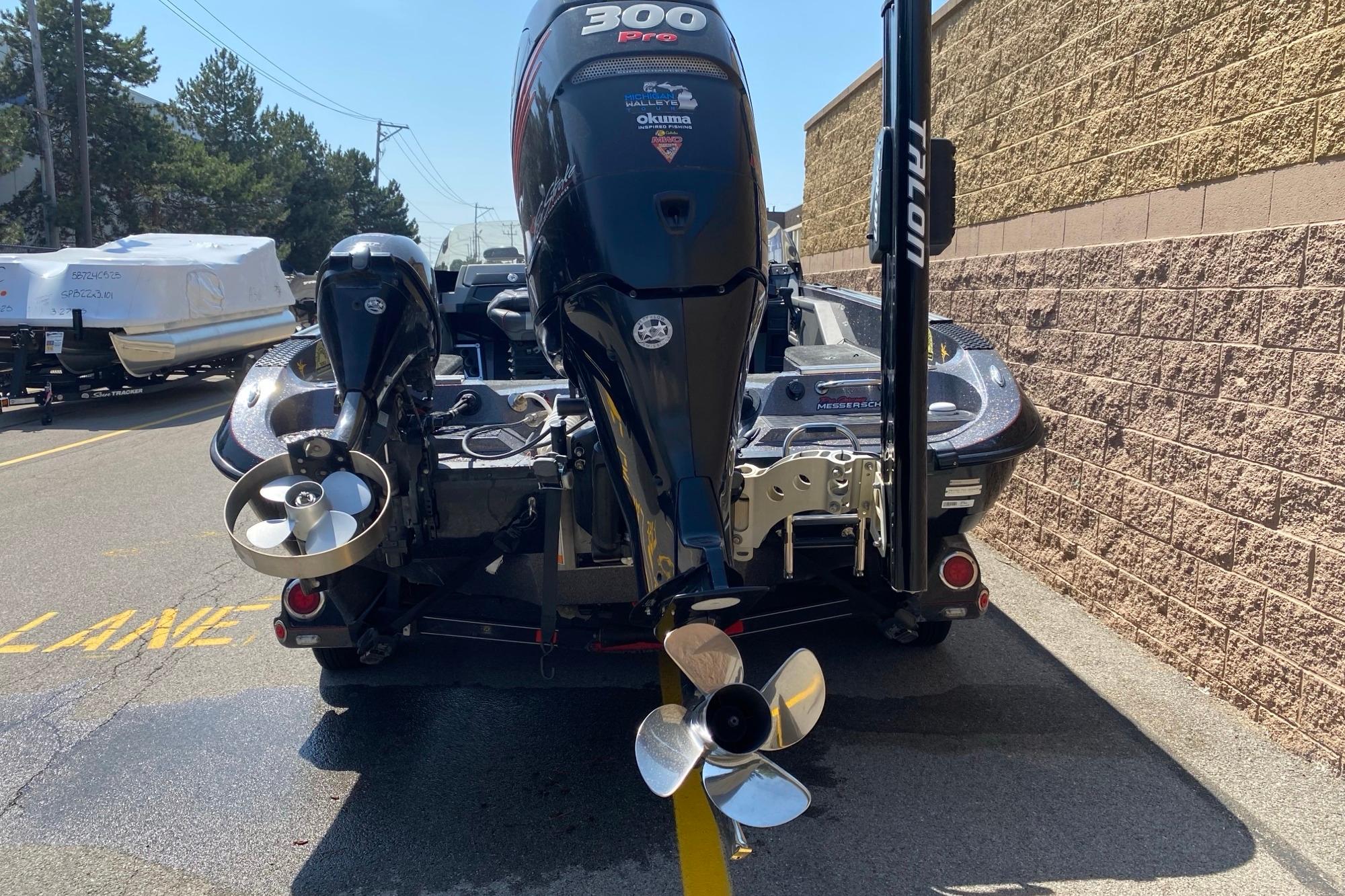 2017 Ranger 621FS Fisherman boat with powerful outboard motor, parked outdoors.