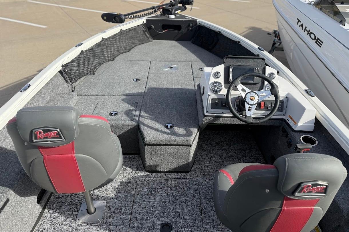 2026 Ranger VS1882SC Reata boat interior with steering console and seating.
