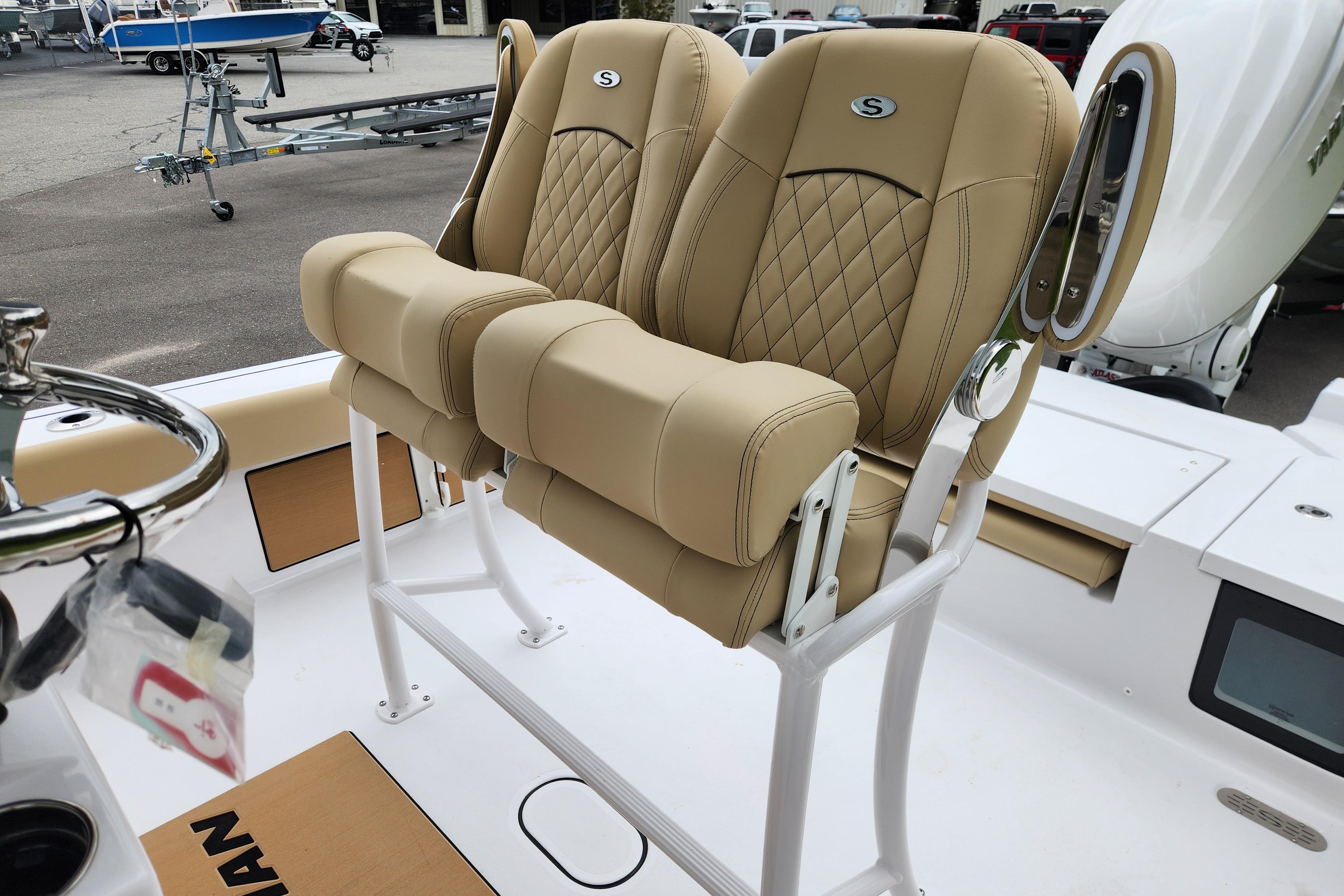 2026 Sportsman Masters 247 Bay Boat with tan leather seats and sleek design.