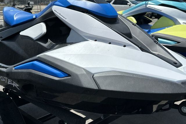 A Yamaha WaveRunner Jetblaster in black with blue accents sits on a trailer.