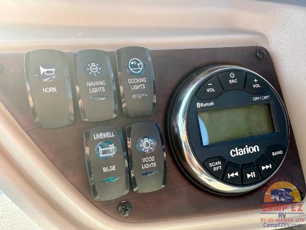 Control panel of 2025 South Bay 224FCR LE with Clarion audio system.