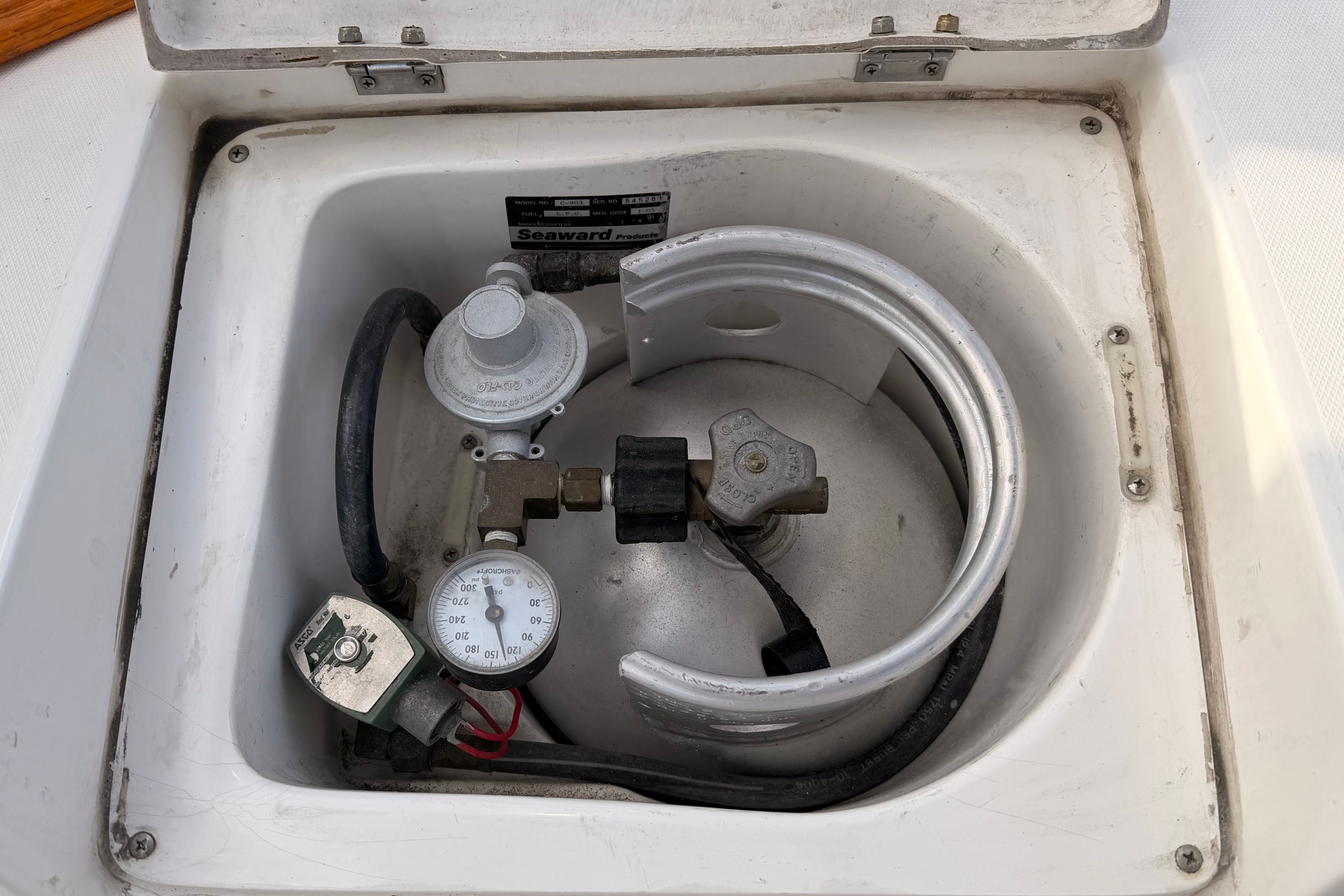 Propane tank in storage compartment of a 2006 Catalina 42 MkII.