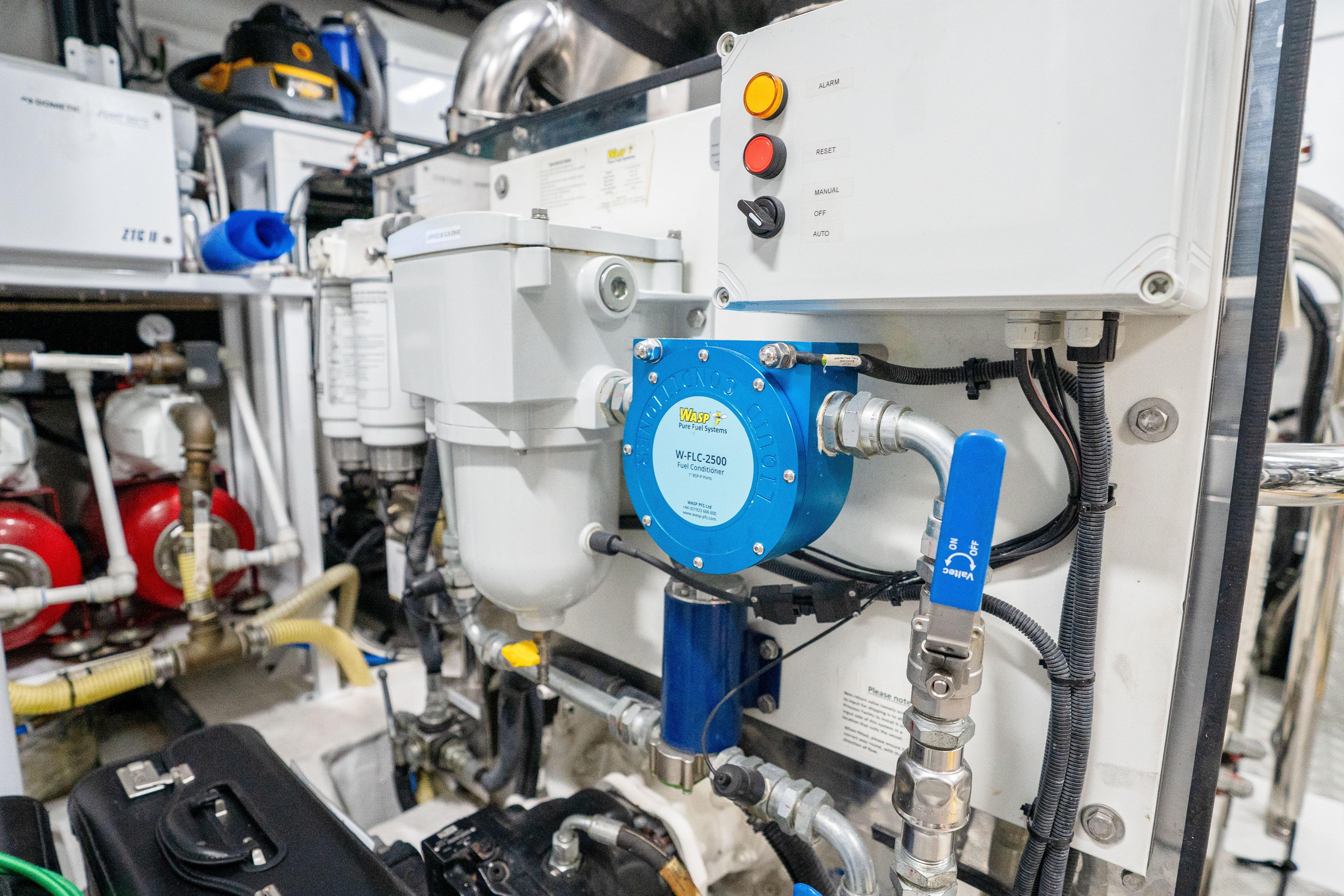 Engine room of 2020 Princess Y85 yacht with advanced fuel filtration system.