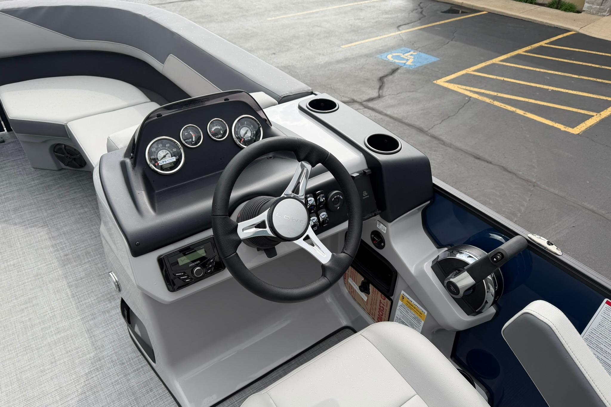 Steering console of 2026 Lowe LS 190 boat with modern controls and gauges.