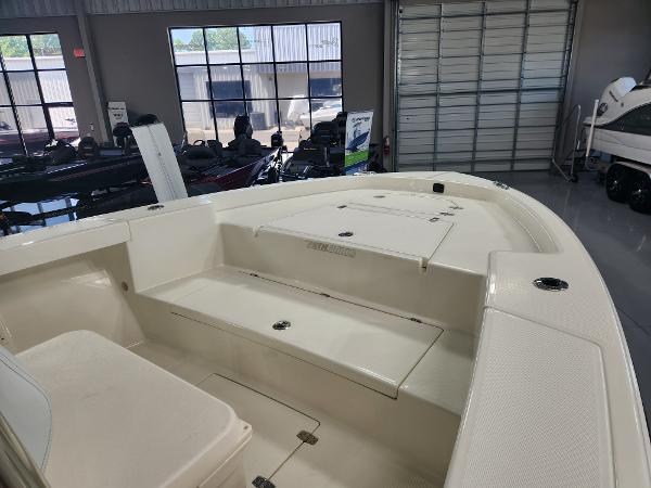 2025 Pathfinder 2400 Open boat interior in showroom setting.