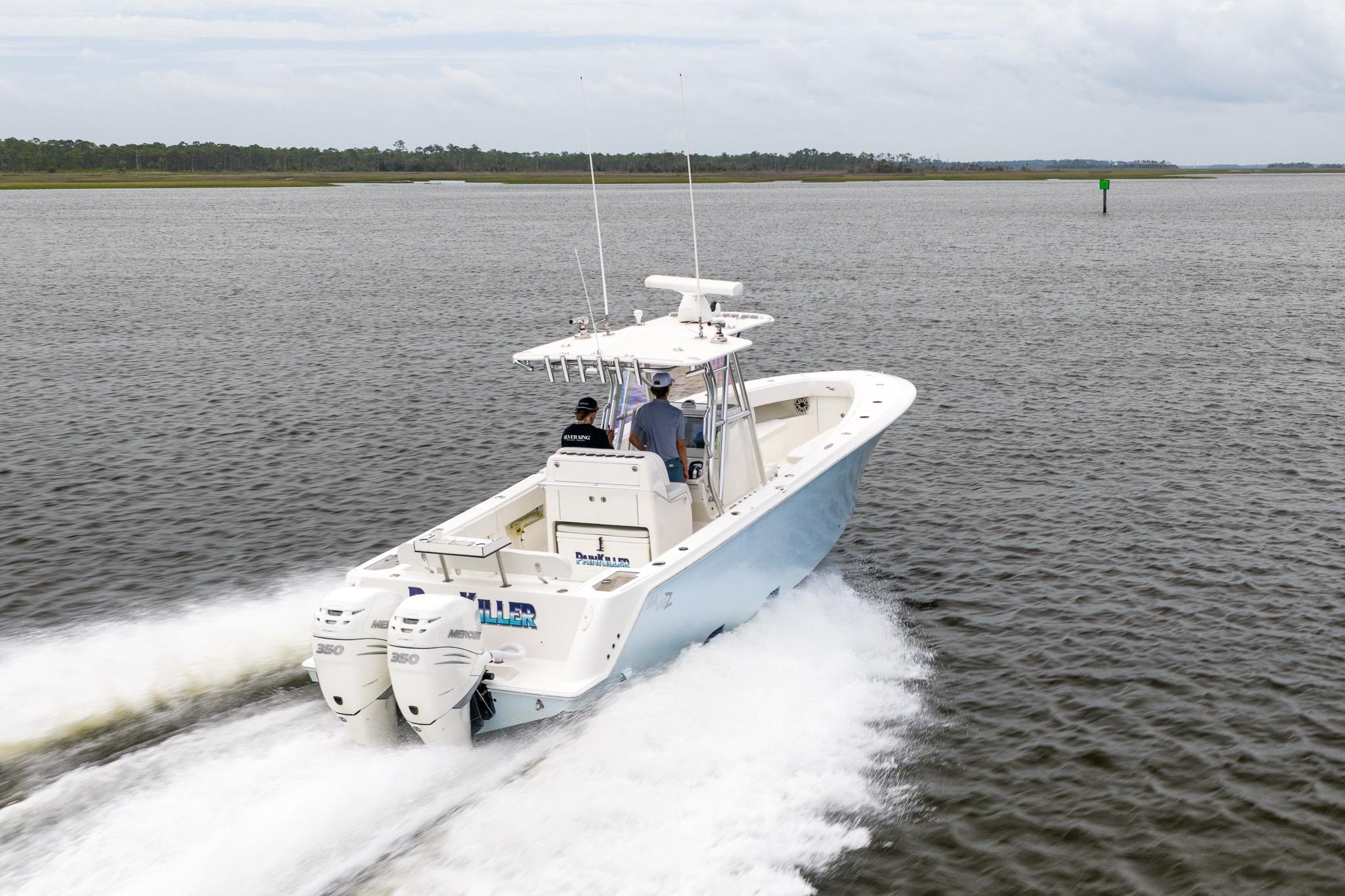 2019 SeaVee 322Z boat cruising on open water with twin Mercury engines.