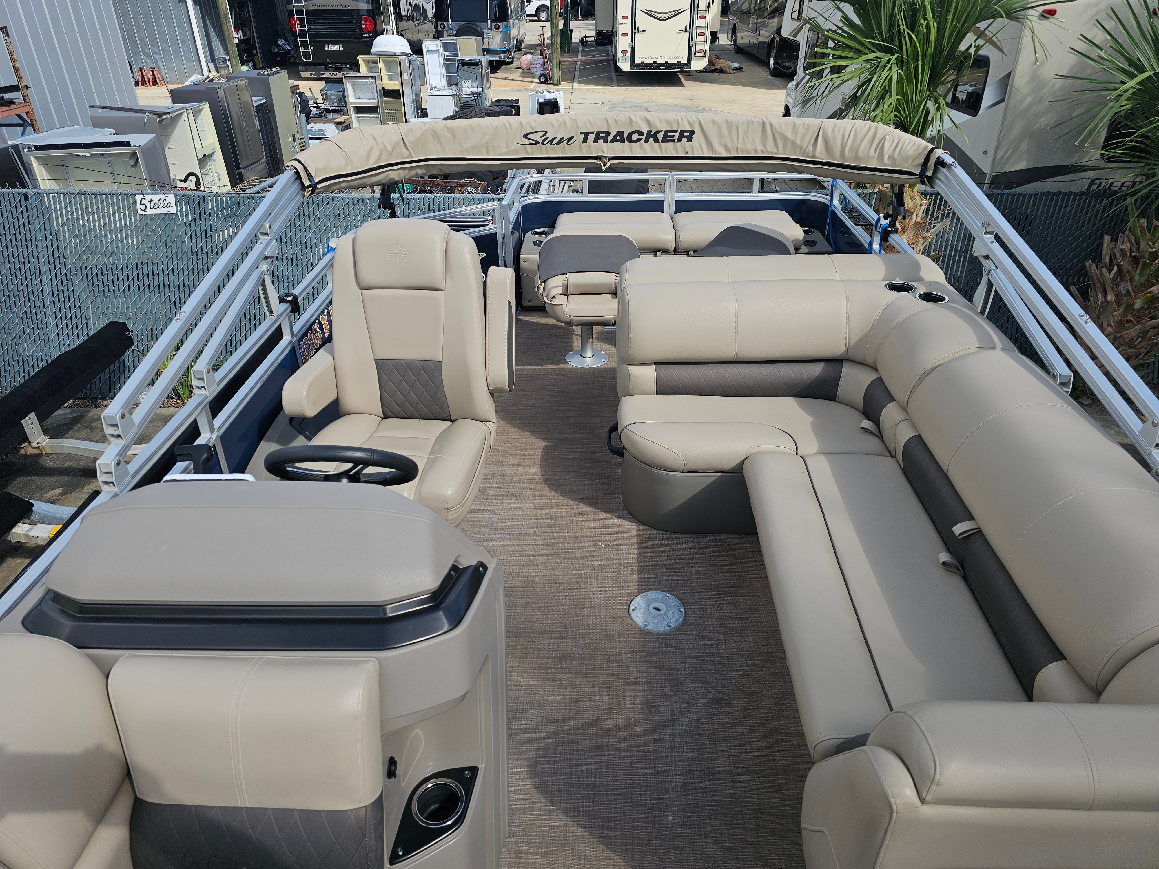 Interior view of 2024 Sun Tracker Fishin' Barge 22 DLX pontoon boat.
