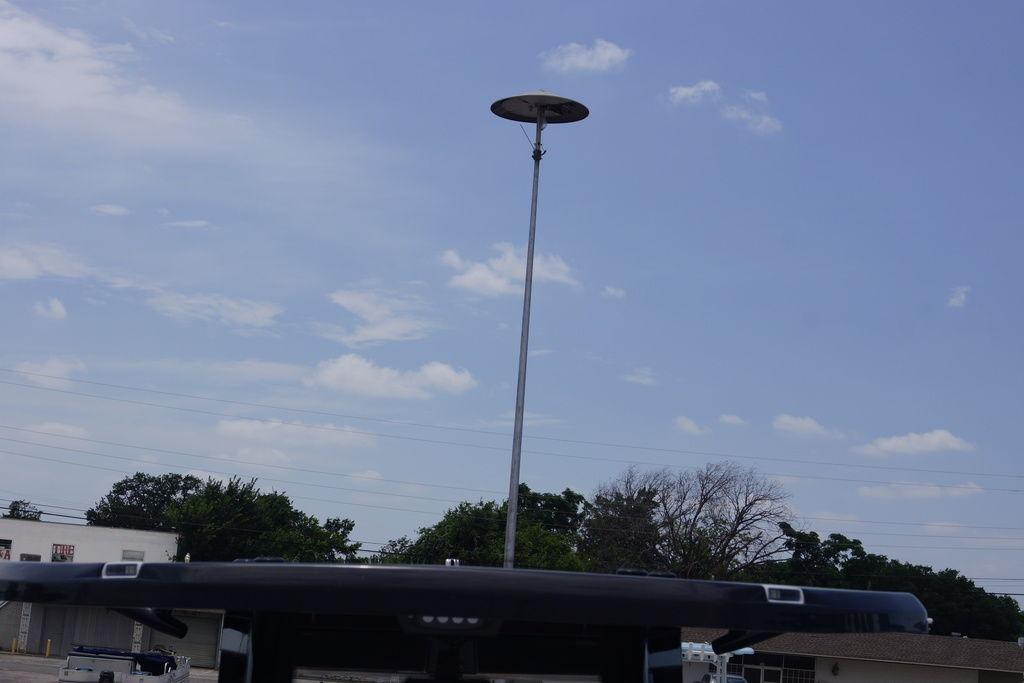 Rooftop view of a Tidewater 2500 Carolina Bay boat, 2027 model, under a clear sky.