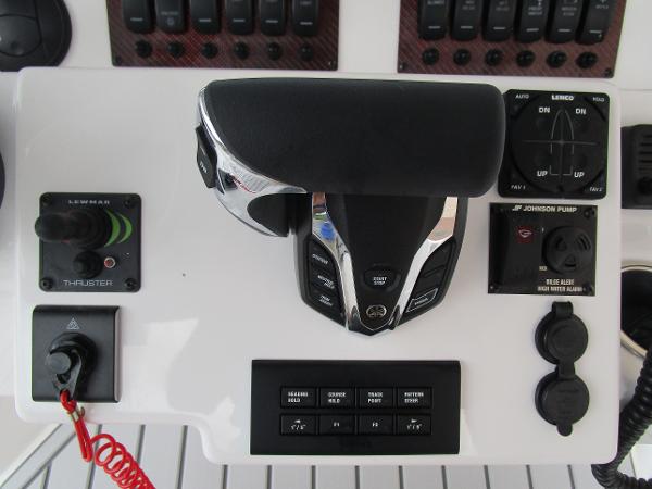Control panel of 2025 Solara S-250 CW boat with throttle and switches.