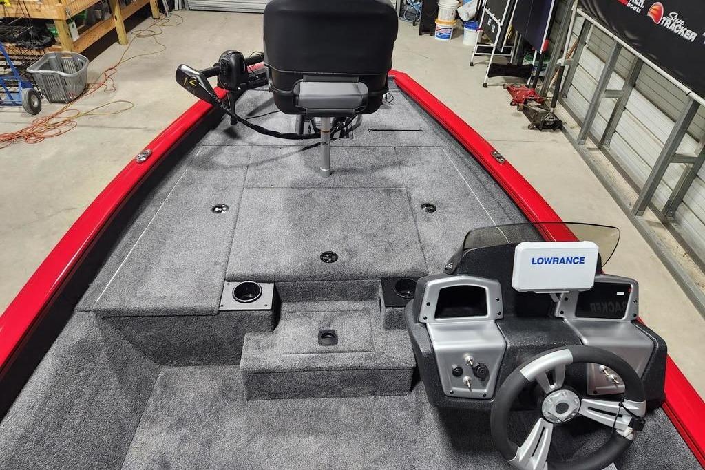2026 Tracker Pro Team 175 boat interior with steering console and Lowrance electronics.