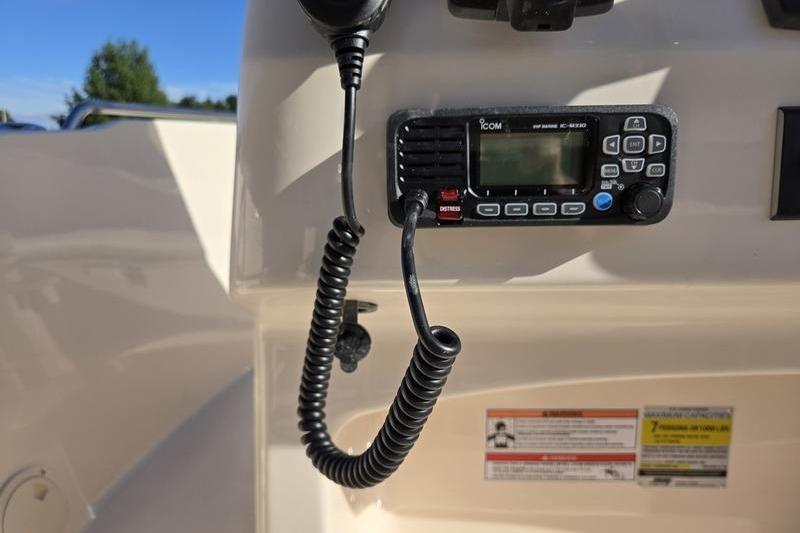 VHF radio on 2026 Grady-White Fisherman 180 boat dashboard.