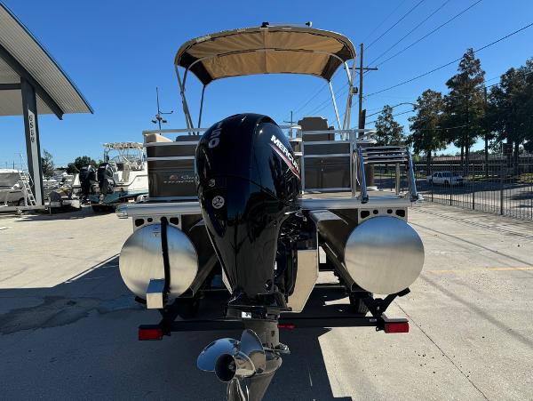 2025 Sun Tracker 24 Sportfish XP3 pontoon boat with Mercury outboard motor.