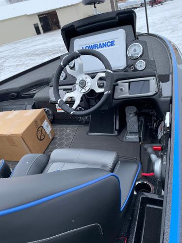 2023 Nitro Z20 boat cockpit with Lowrance electronics and steering wheel.