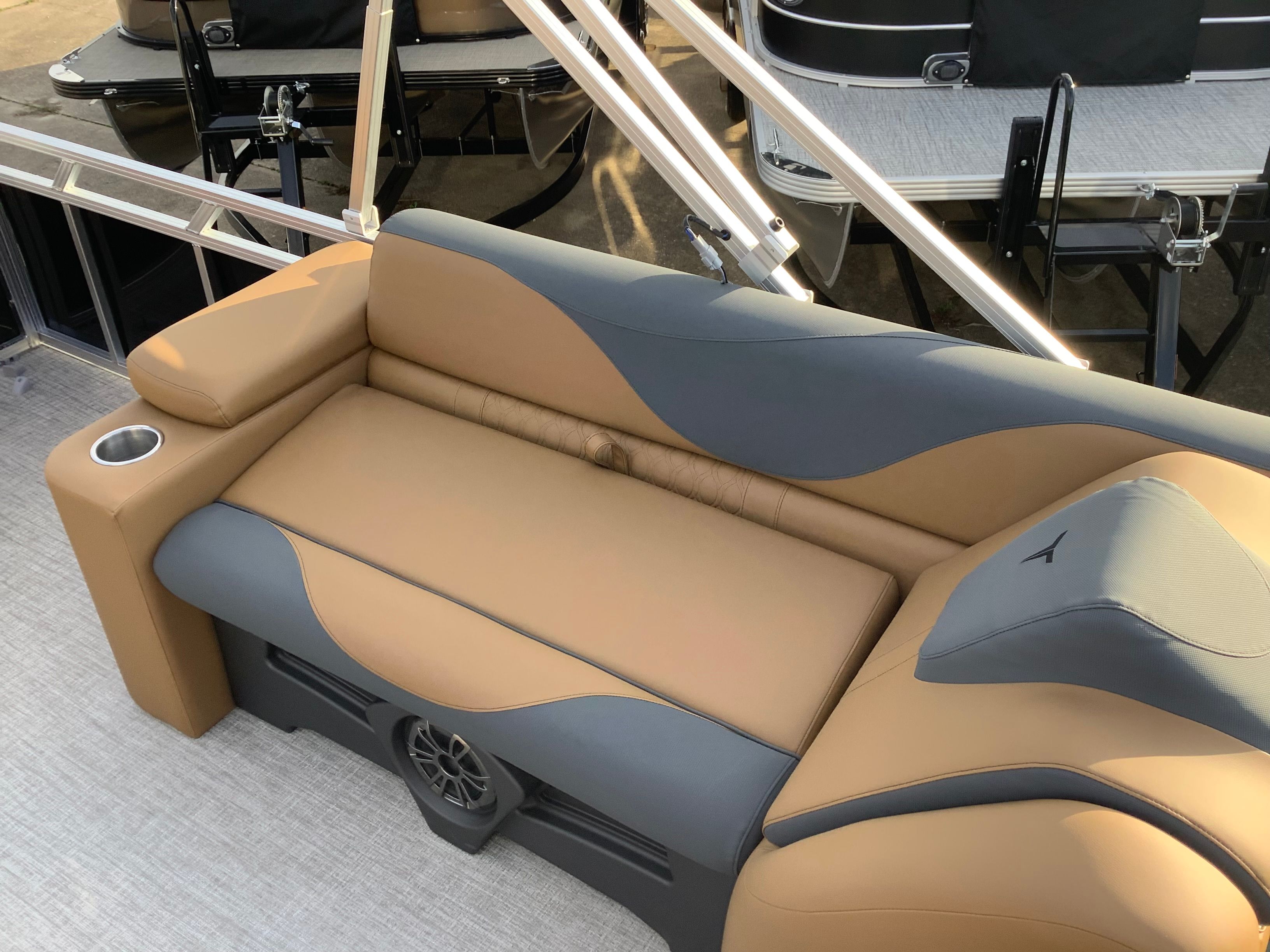 Luxurious seating on Tahoe 2385 LTZ pontoon boat, 2026 model.