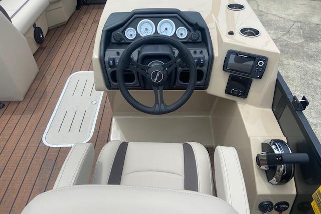 2026 Bentley Pontoons Legacy 223 Swingback dashboard with steering wheel and controls.
