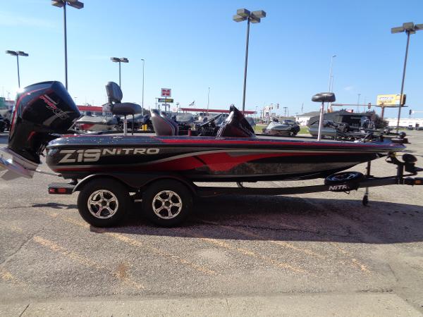 2024 Nitro Z19 Pro fishing boat on trailer in outdoor dealership.
