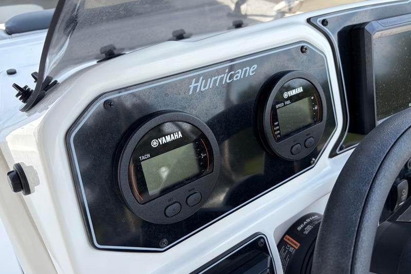 Dashboard of 2026 Hurricane SunDeck Sport 2050 OB with Yamaha gauges.