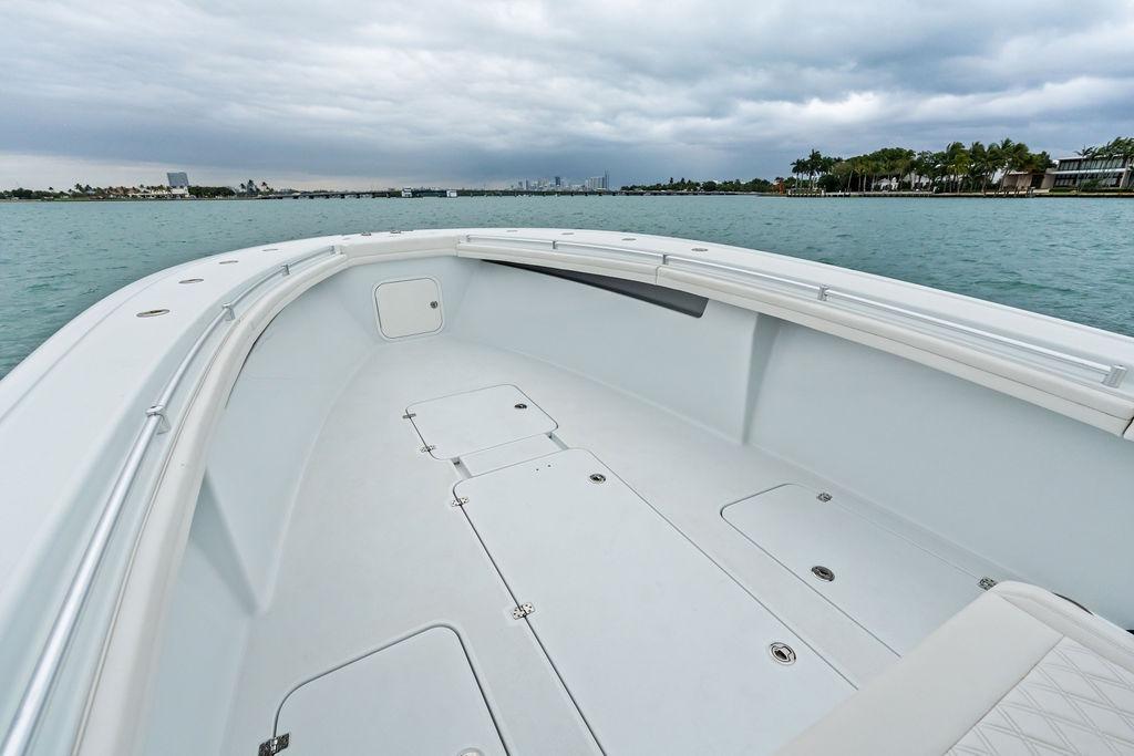 2021 Yellowfin 36 Offshore boat deck with ocean view and cloudy sky.