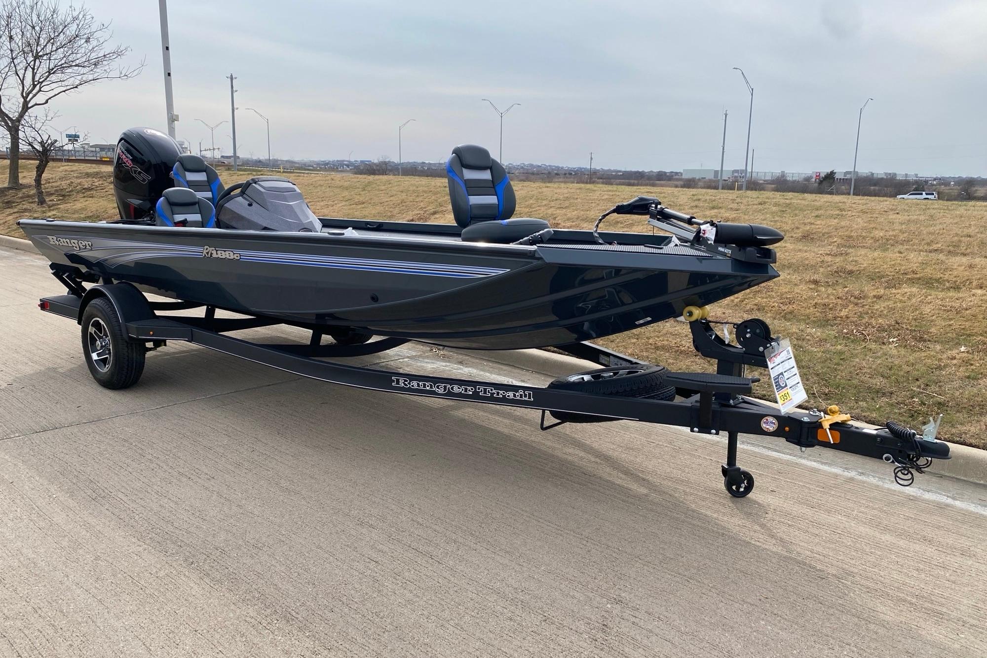 2026 Ranger RT188C fishing boat on trailer, parked on roadside.