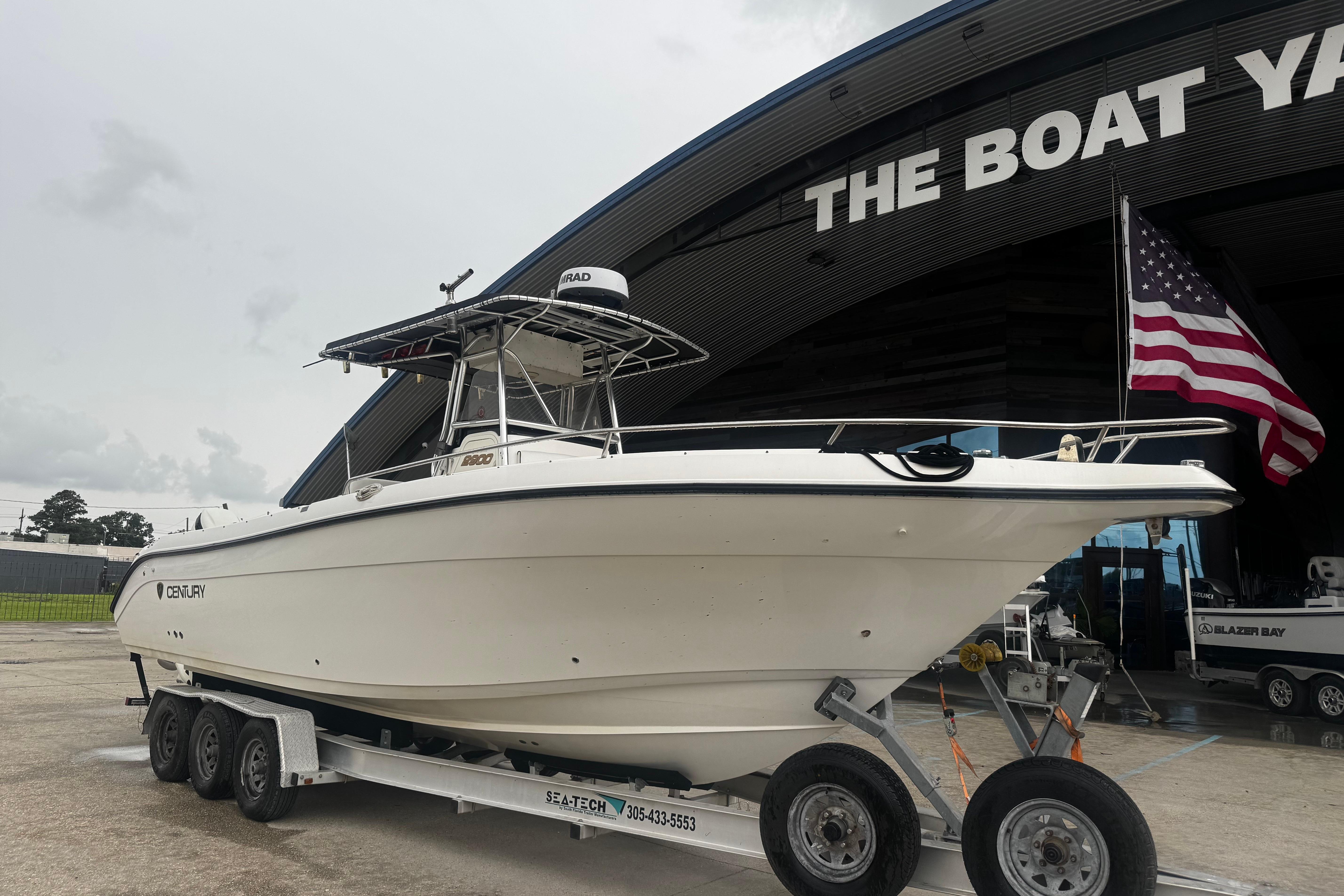 2004 Century 2900 Center Console boat on trailer at The Boat Yard.