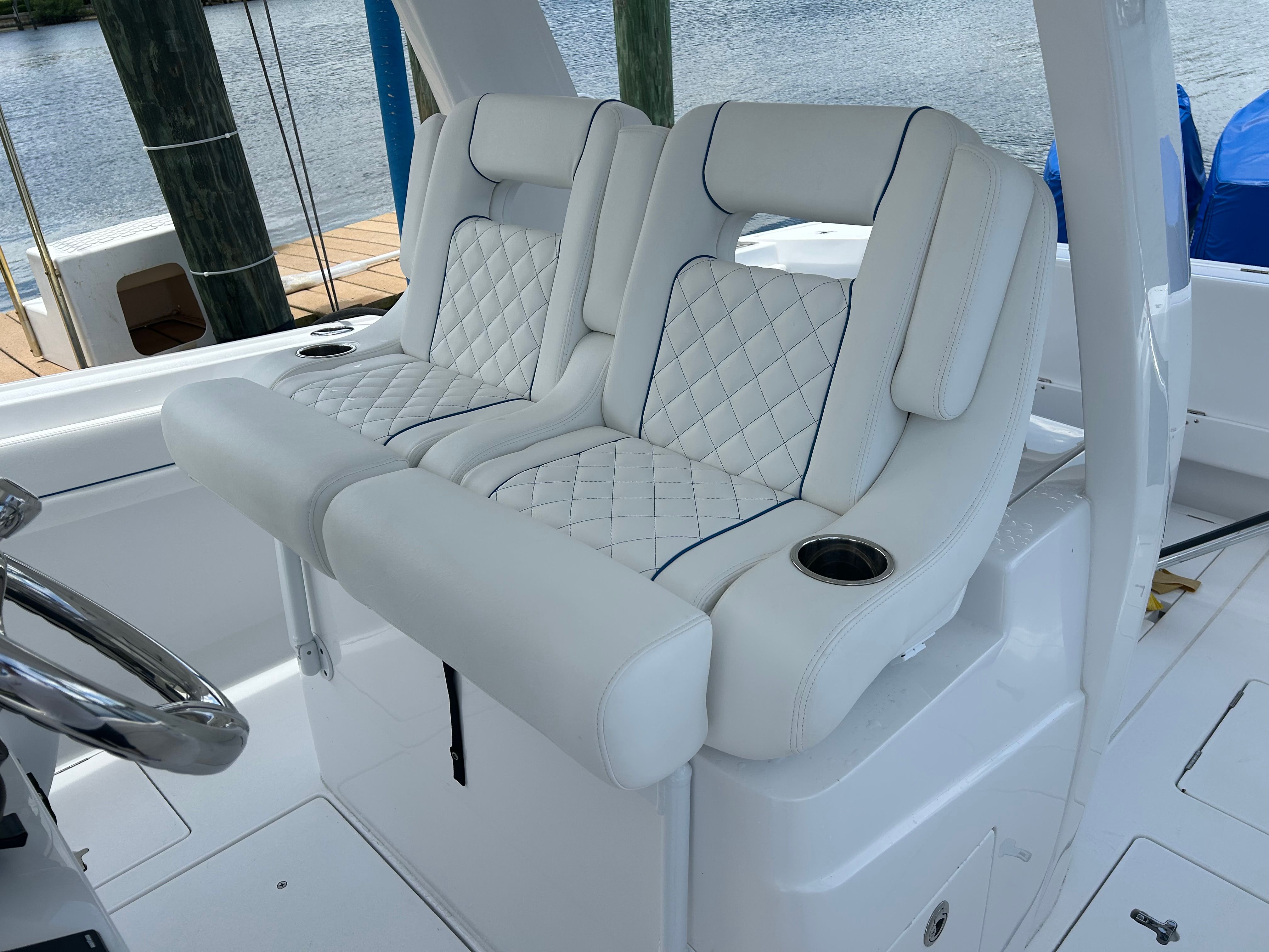 Luxurious seating in the 2025 Intrepid 375 Nomad SE boat.