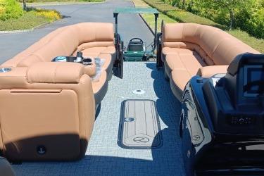 2026 Regency 250 DL pontoon boat interior with plush seating and modern design.