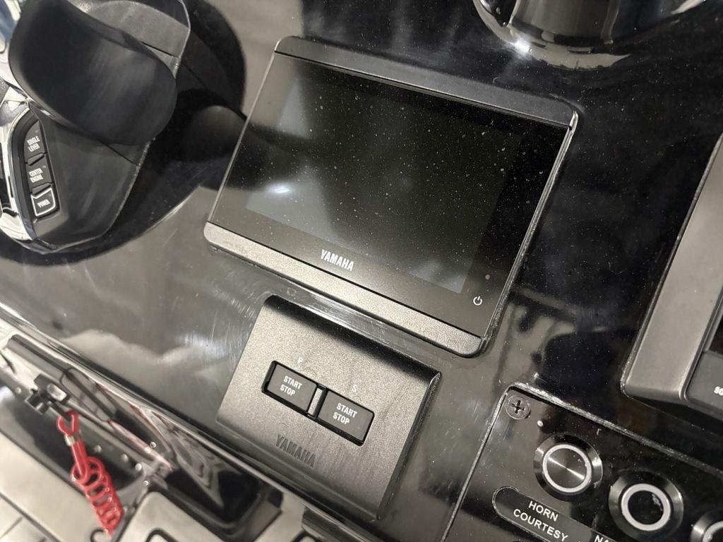 Control panel of a 2026 Tidewater 2700 CB boat featuring a Yamaha display.