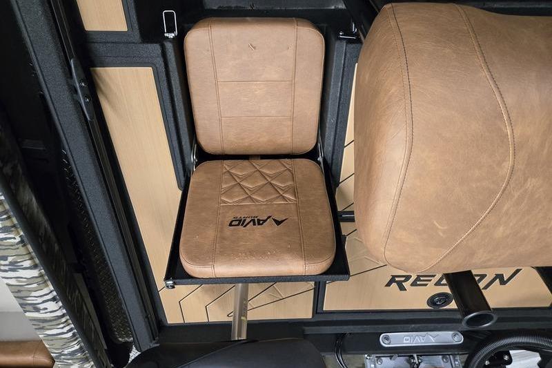 Brown leather seats in a 2026 Avid 207 Recon vehicle interior.