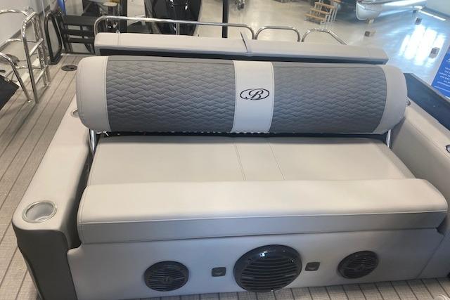 2026 Bentley Pontoons Elite 223 Swingback interior with quilted seating and integrated speakers.