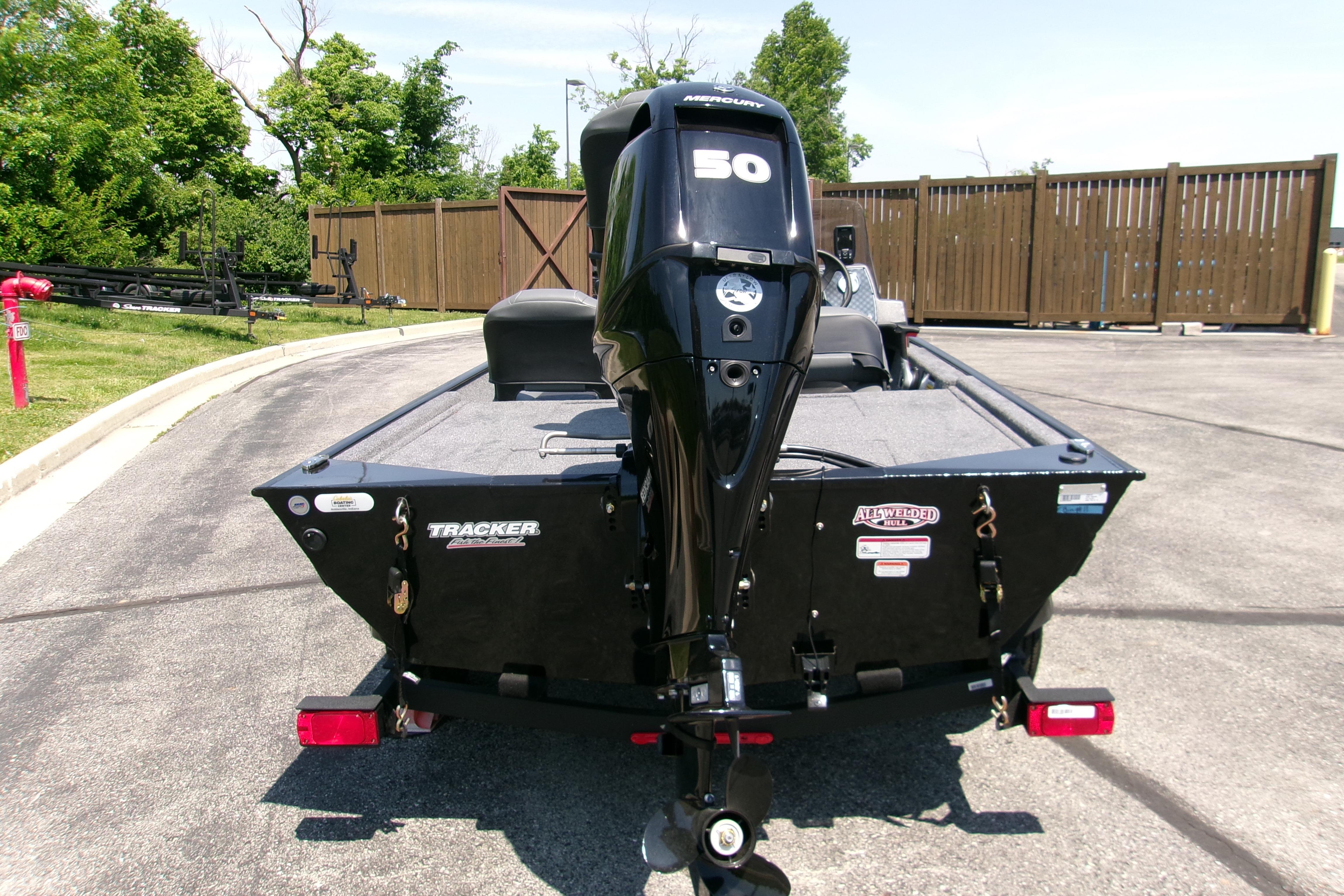 2026 Tracker Bass Tracker Classic XL boat with Mercury 50 engine, parked outdoors.