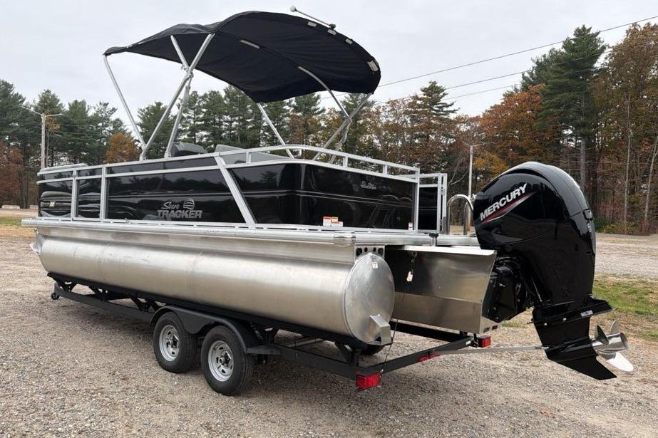 2026 Sun Tracker Party Barge 22 RF XP3 pontoon boat with Mercury outboard motor.