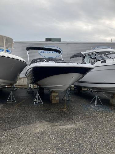 2024 SouthWind 2400 SD boat on stands in a marina.