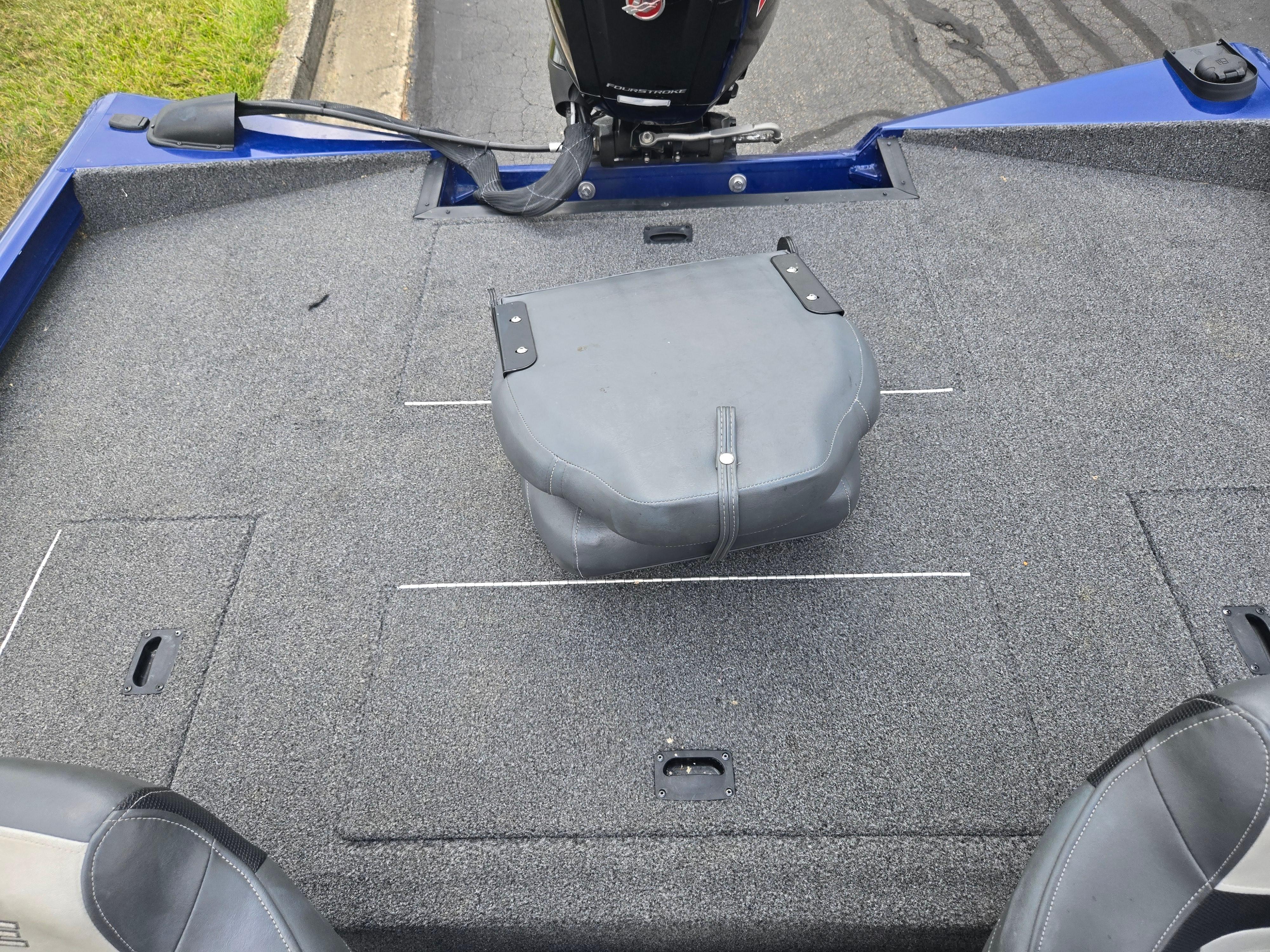 2021 Lowe Stinger 188 boat deck with motor and seating.
