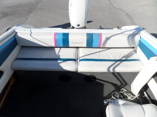 1992 Rinker Captiva 170 OB boat interior with white and blue seating.